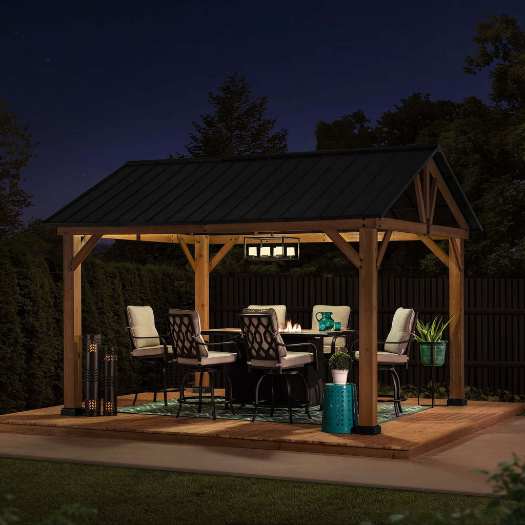 TÖDI 336cm x 400cm Cedar Framed Gazebo with Anthracite Steel Gable Hardtop - full view night